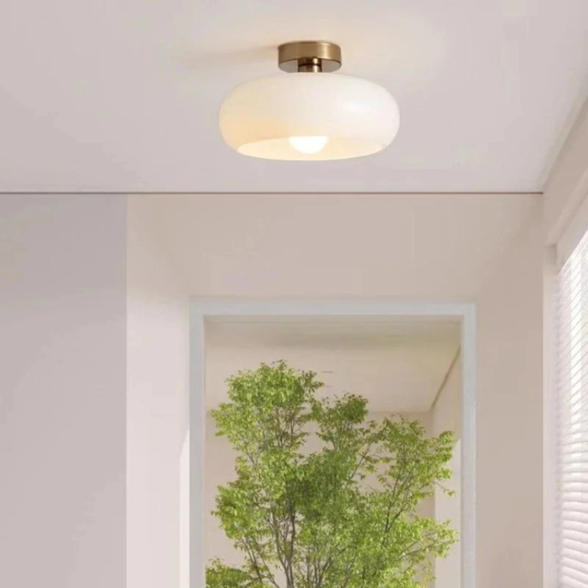 Plafonnier design en verre soufflé orange et blanc avec éclairage LED doux - PlafonnierDeco