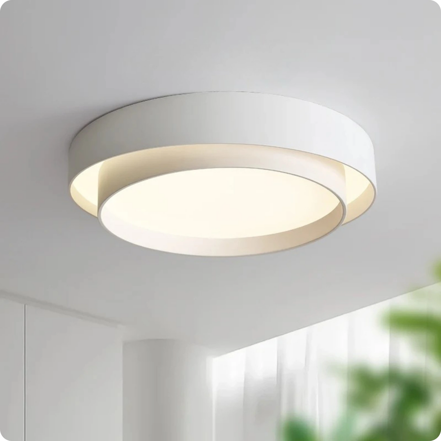 Plafonnier design circulaire en fer et acrylique avec lumière modulable - PlafonnierDeco